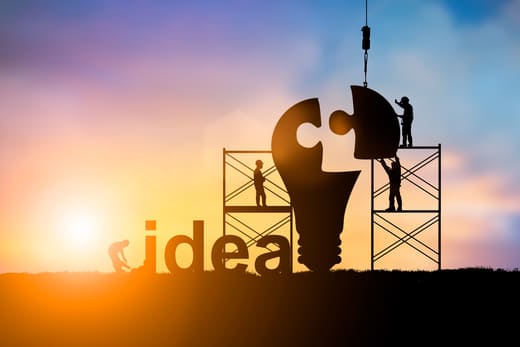 Schriftzug „idea“ und Glühbirne: von Ihrem Texter Ratgebertexte schreiben lassen und Ratgeber-Themen erstellen lassen.